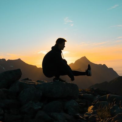 silhouette on man on mountain